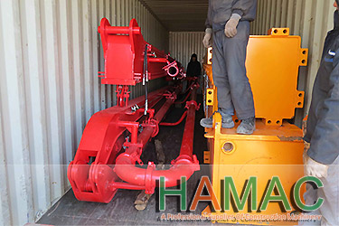 Self-climbing concrete placing boom
